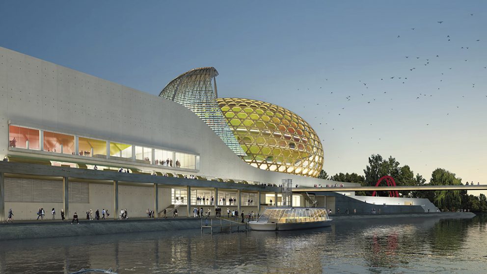 Cité musicale de l’île Seguin à Boulogne-Billancourt en France, ouverture prévue en 2016. Vue depuis la Seine, la Cité musicale offre des promenades le long du fleuve. Le dôme en bois recouvre la salle de musique classique.